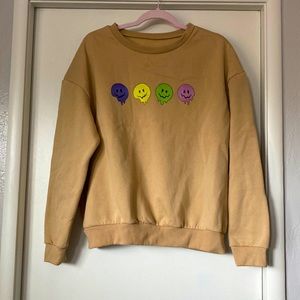 Smiley face sweater